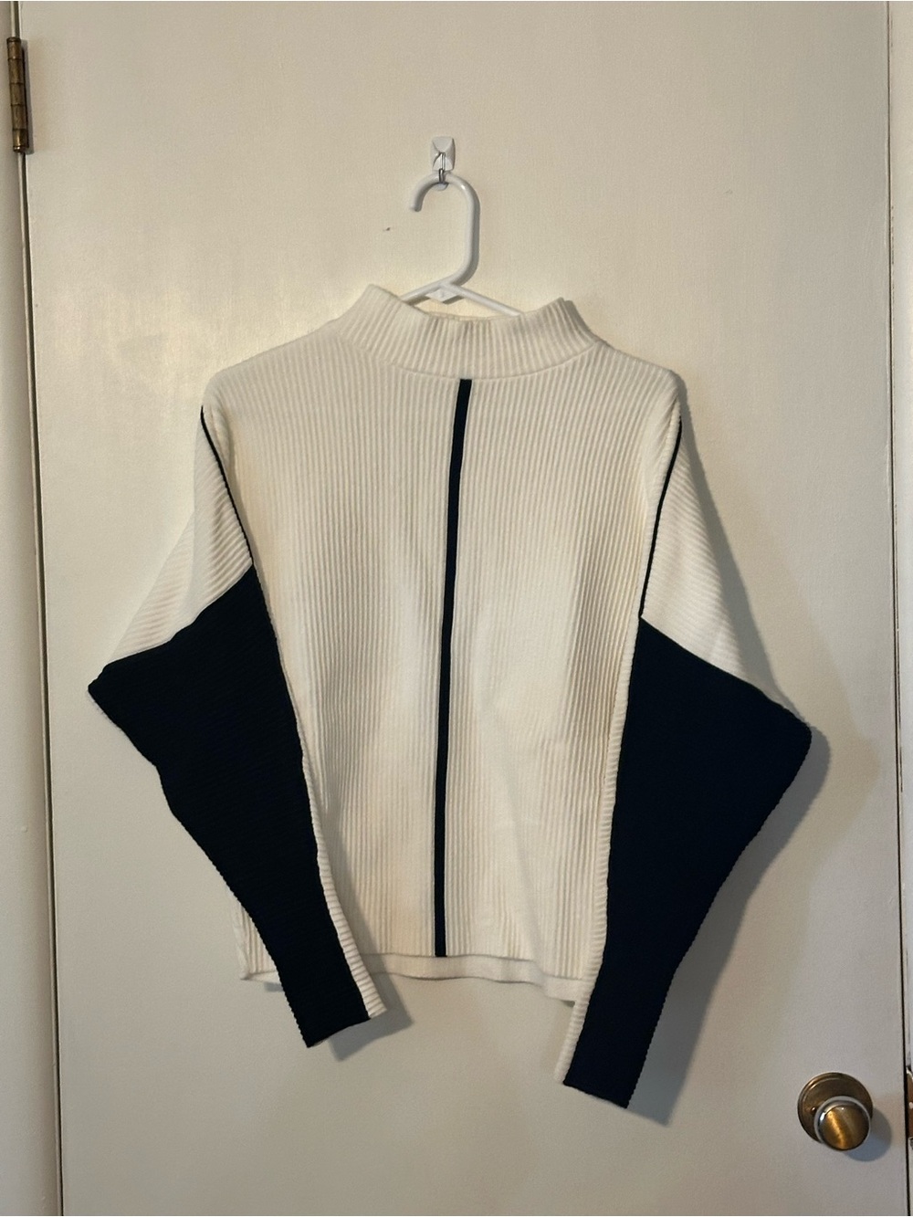 Philosophy women’s white ribbed mock-neck sweater with contrasting black sleeves